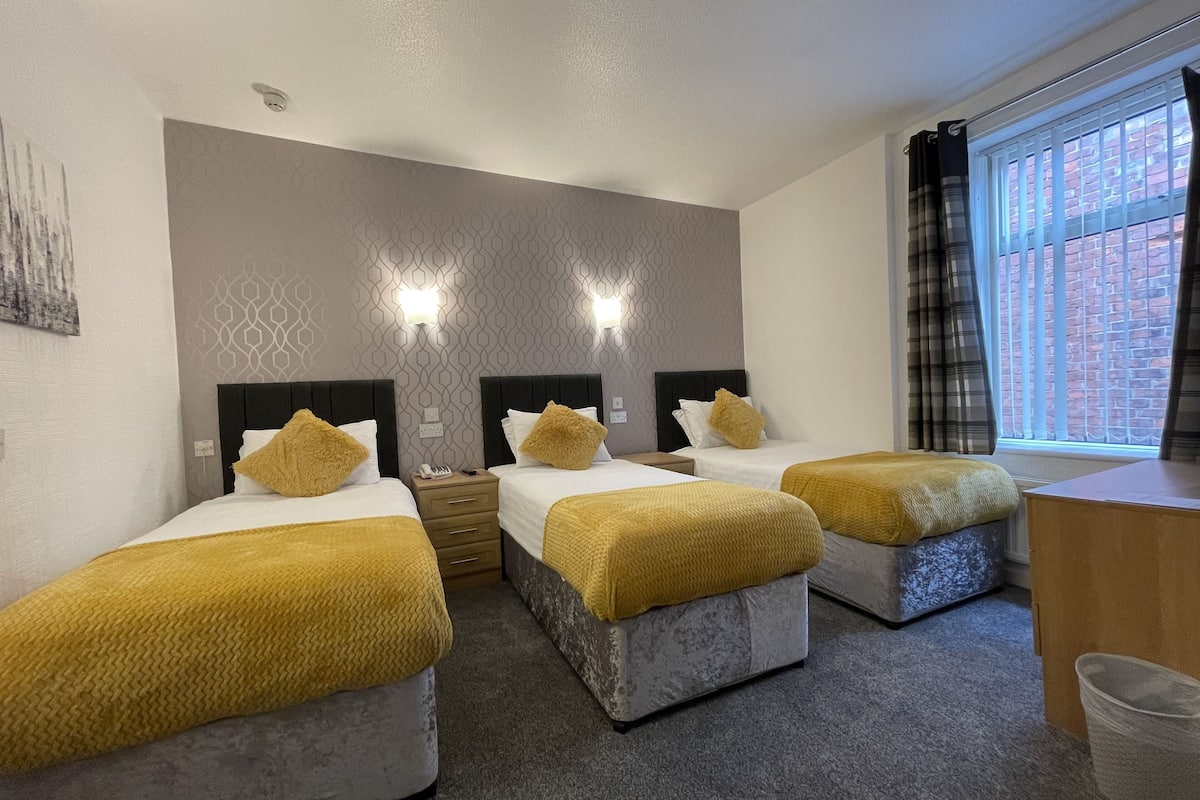 standard triple room, 3 single beds | 1 bedroom, blackout curtains, iron/ironing board, free wifi