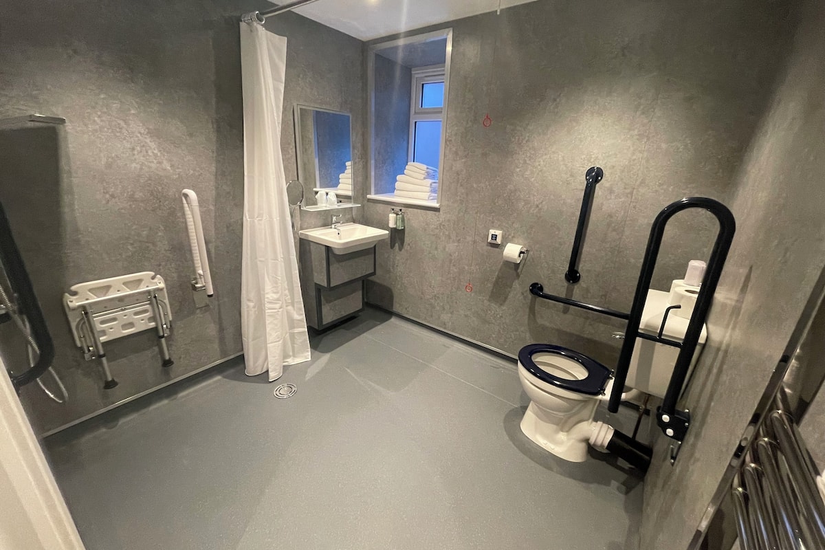 family m2 adapted suite (2 bedroom) | bathroom | shower, designer toiletries, hair dryer, towels