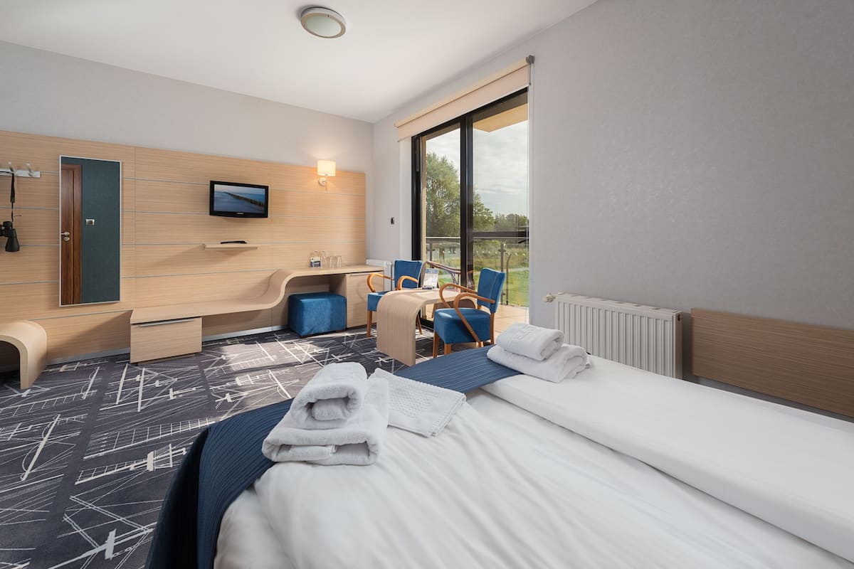 double or twin room | premium bedding, minibar, in-room safe, desk