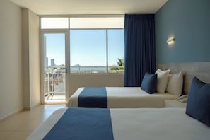 Standard Room, Ocean View | In-room safe, iron/ironing board, free WiFi, bed sheets