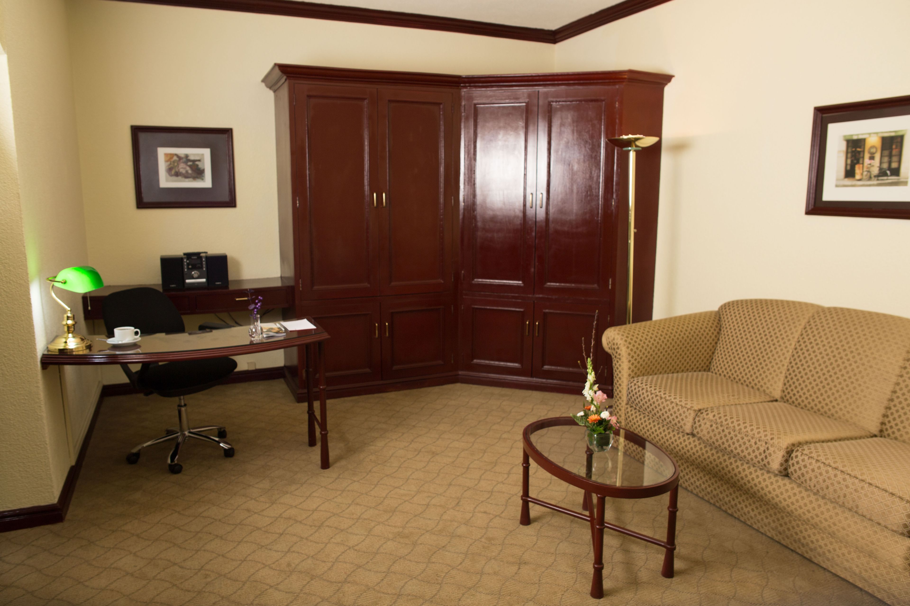 junior suite, multiple beds | living area | 32-inch flat-screen tv with cable channels