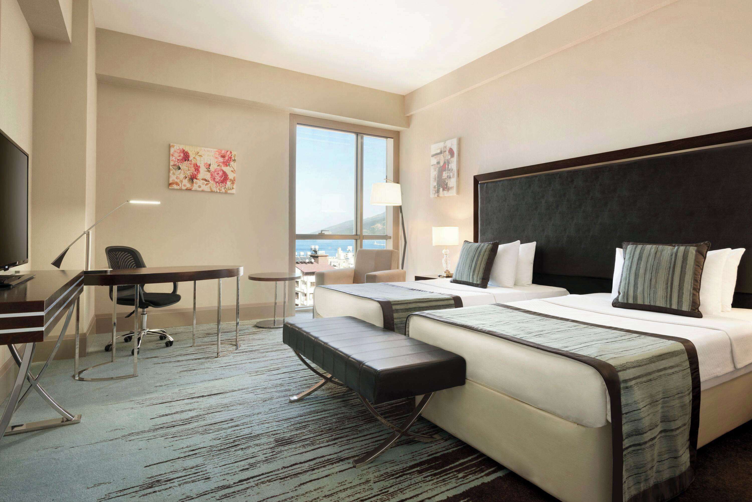 room, 2 single beds, non smoking | minibar, in-room safe, desk, soundproofing