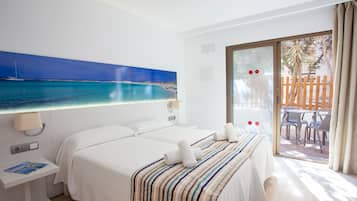 Minibar, desk, bed sheets