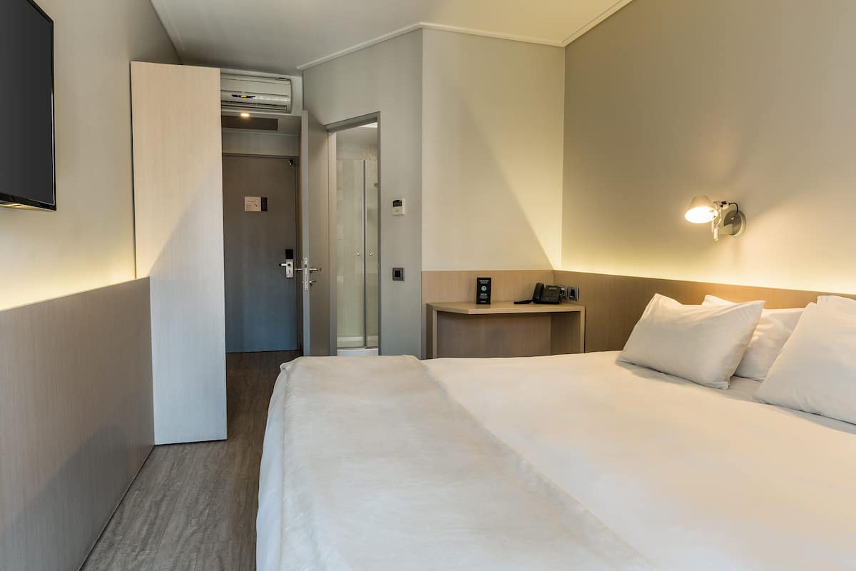 In-room safe, laptop workspace, blackout drapes, soundproofing