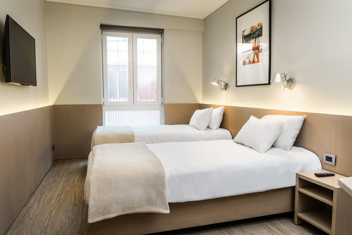 In-room safe, laptop workspace, blackout drapes, soundproofing