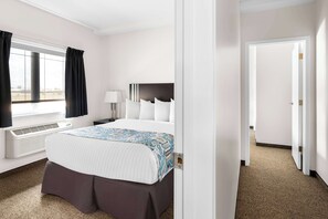 Executive Suite, 2 Queen Beds, Kitchen, Ground Floor | Individually furnished, blackout drapes, free WiFi, bed sheets
