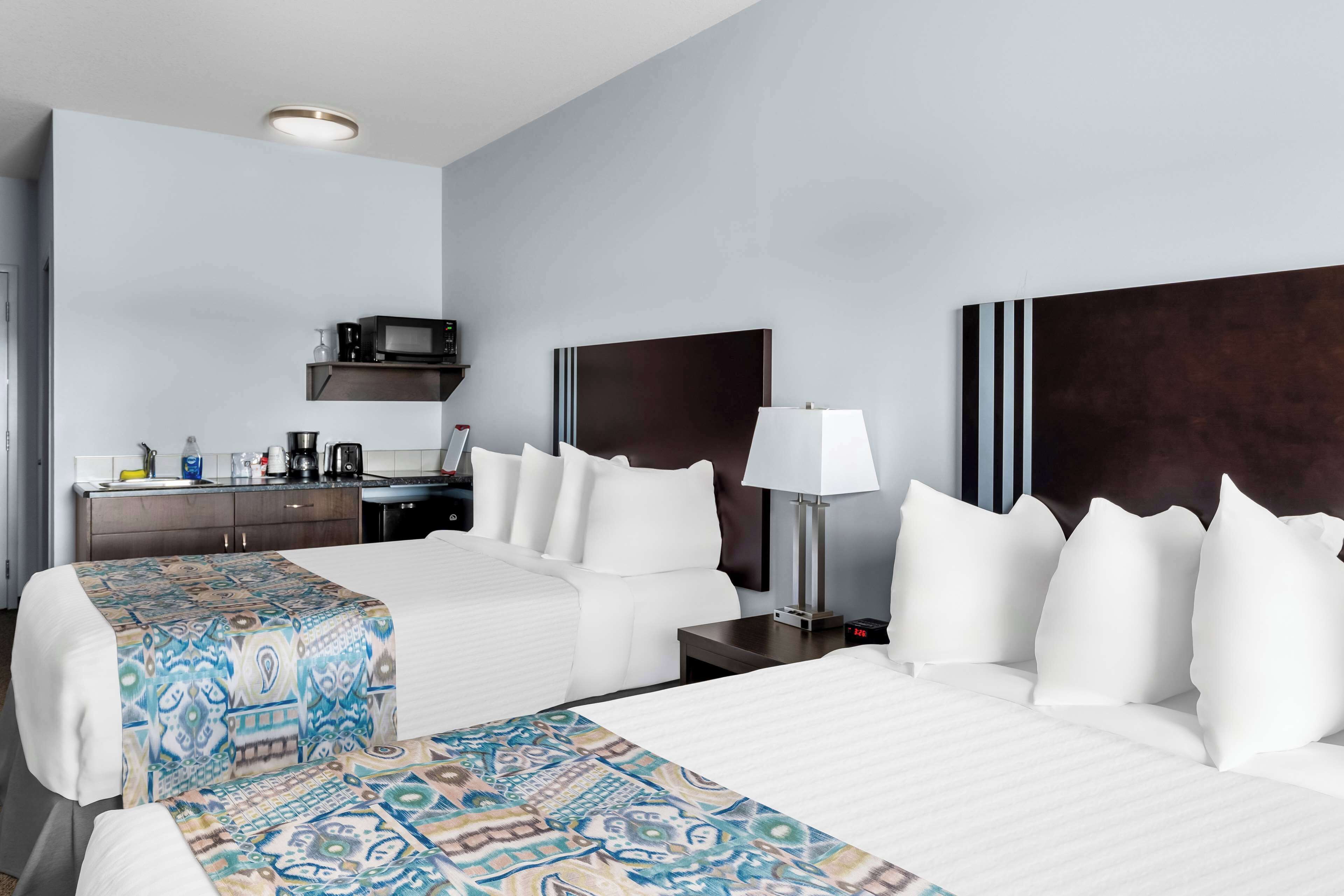 standard room, 2 queen beds, non smoking, kitchenette (dining table) | individually furnished, blackout curtains, free wifi, bed sheets