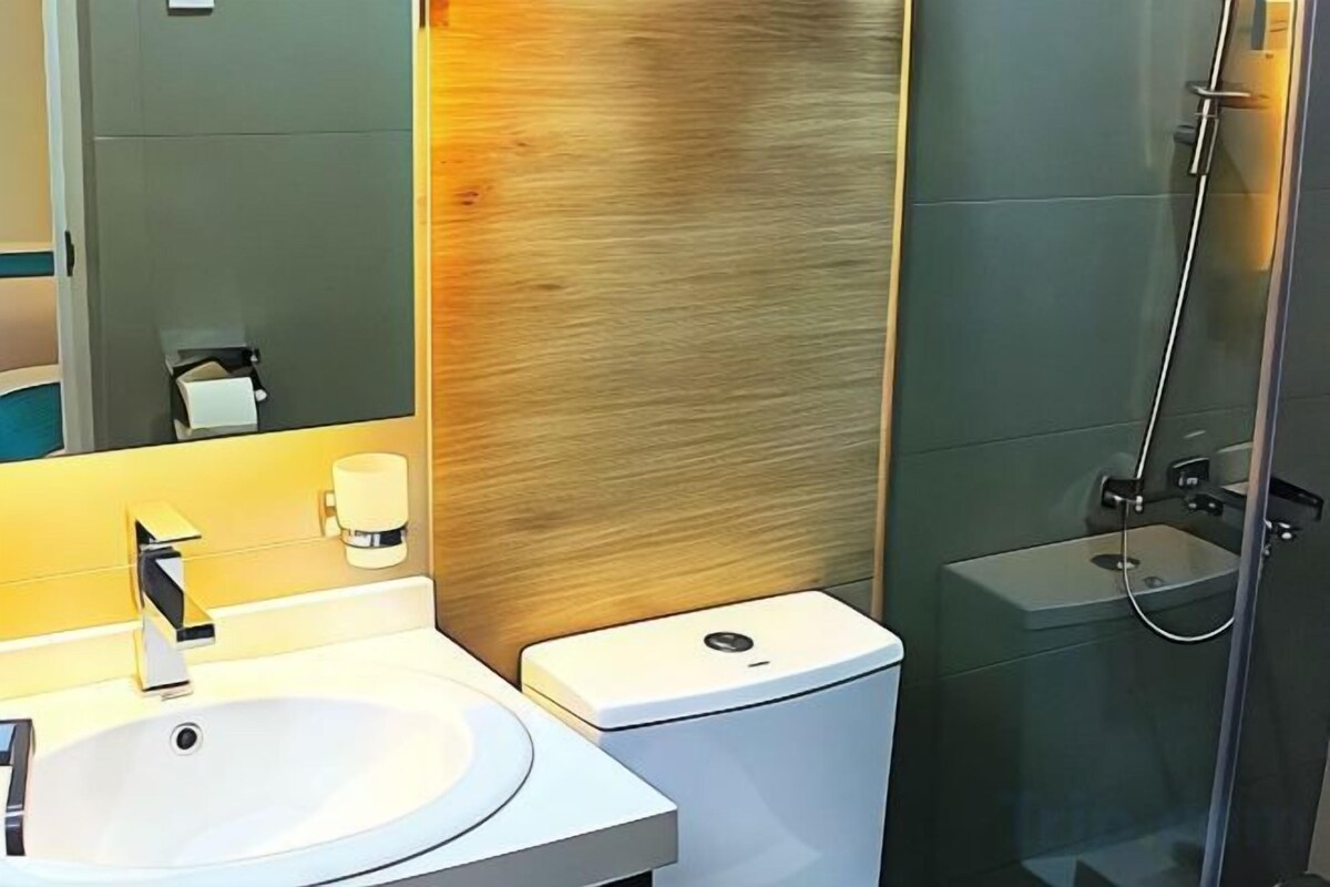 Bathroom | Shower, free toiletries, hair dryer (on request), slippers
