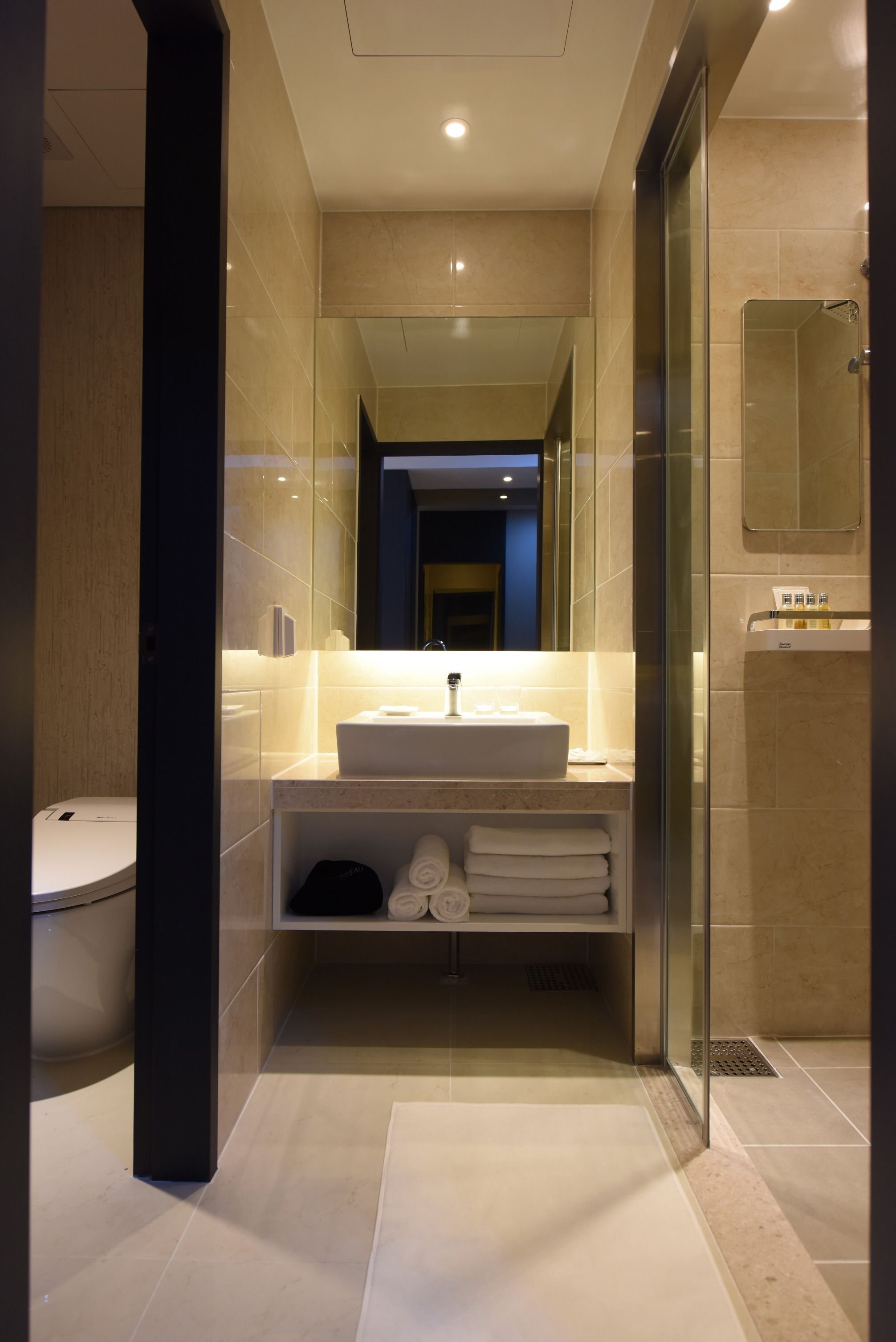 deluxe twin room | bathroom | shower, designer toiletries, hair dryer, bathrobes