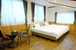 Extra Type of the 3rd Village (2Double beds, Japanese Futons are arranged for 3rd & more guests) | Individually decorated, blackout drapes, free WiFi, bed sheets - Churaumi Village (Motobu)