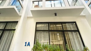 A modern building with multiple balconies and large windows. - Luxx Boutique Boracay (Boracay Island)