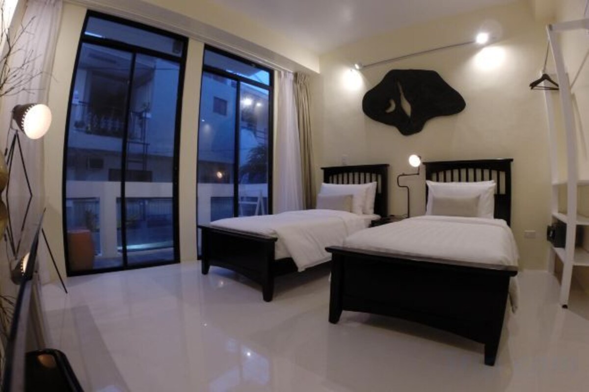 Luxe beddengoed, donsdekens, pillowtop-bedden, een kluis op de kamer