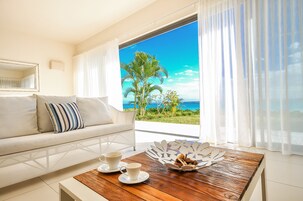 Apartment, 2 Bedrooms, Kitchen, Ocean View | Living area | 39-inch TV with satellite channels