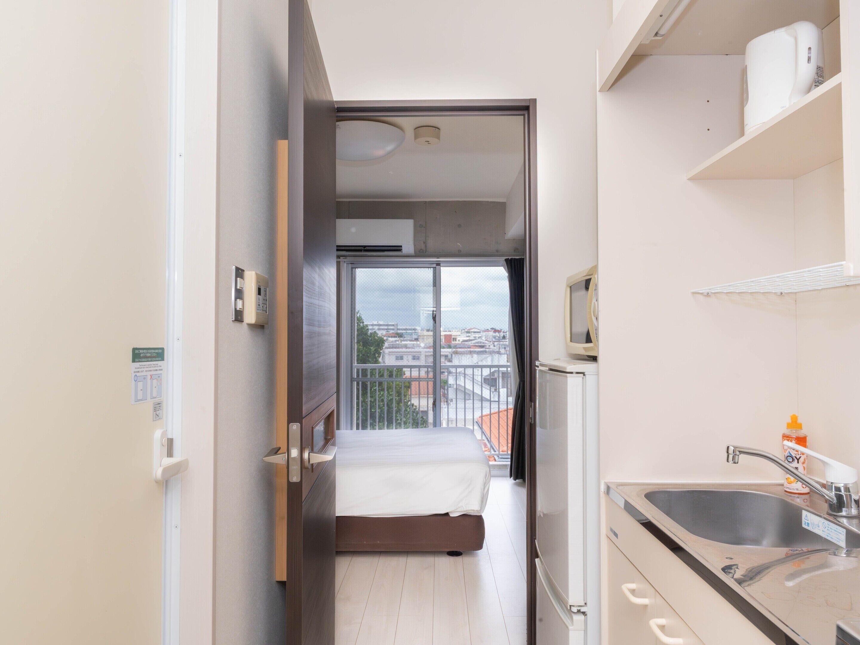 Doppelzimmer, Nichtraucher, Küche (Washer&Lounge Access/Condo Building) | Allergikerbettwaren, Daunenbettdecken, individuell eingerichtet