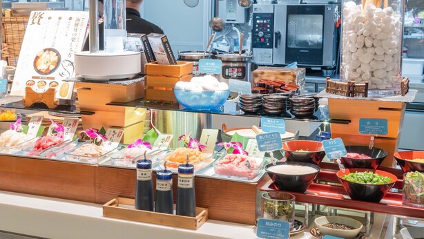 A food display with various dishes and condiments. - The BREAKFAST HOTEL PORTO Ishigakijima (Ishigaki)