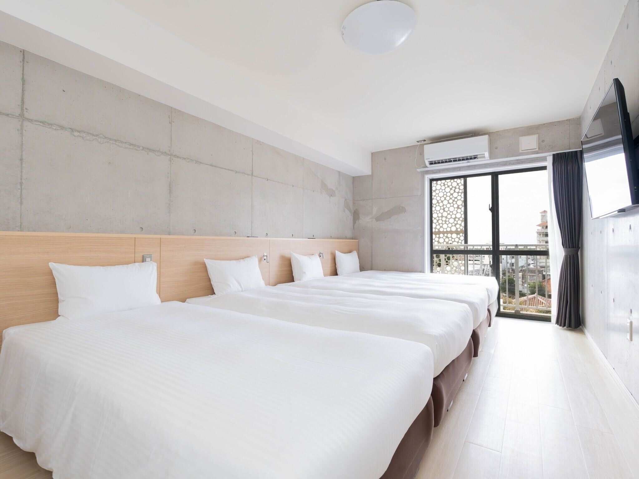 Quad Room in Hotel Building, Non Smoking | Hypo-allergenic bedding, down comforters, individually furnished