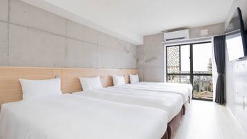 Quad Room in Hotel Building, Non Smoking | Hypo-allergenic bedding, down comforters, individually furnished