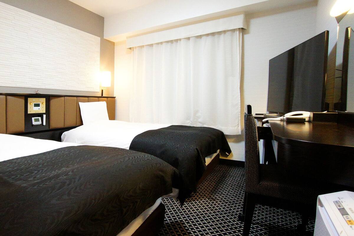 Desk, blackout drapes, iron/ironing board (on request), WiFi (free)