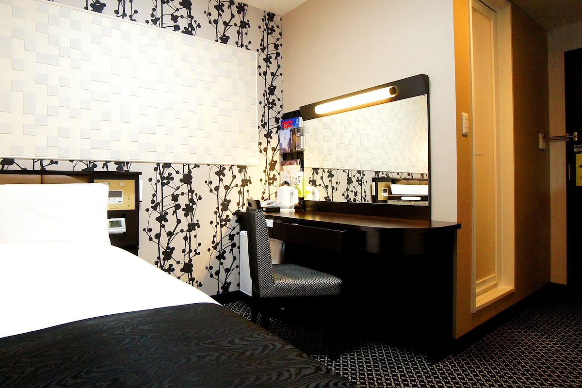 Desk, blackout drapes, iron/ironing board (on request), WiFi (free)