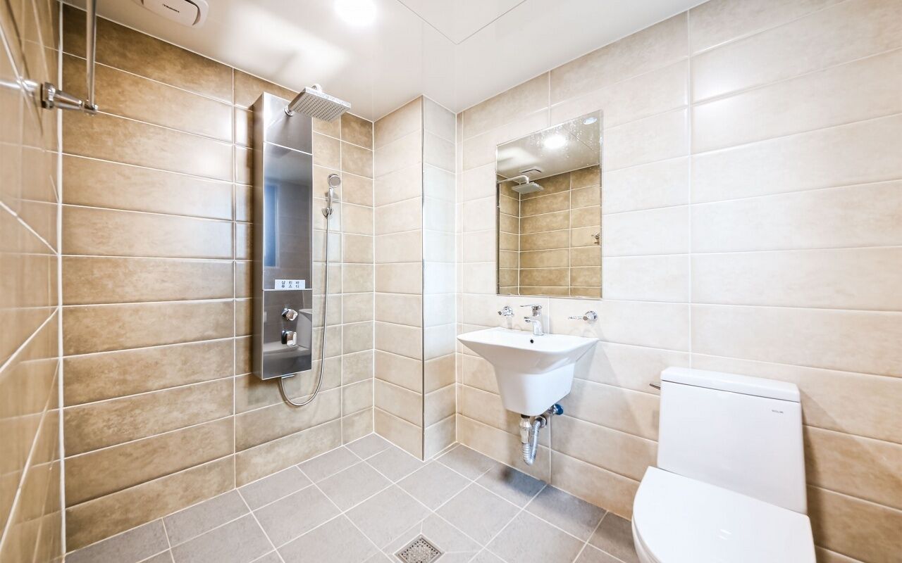 deluxe room (rate for 2) | bathroom | shower, rainfall showerhead, free toiletries, hair dryer