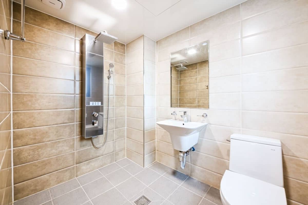 deluxe room (rate for 2) | bathroom | shower, rainfall showerhead, free toiletries, hair dryer
