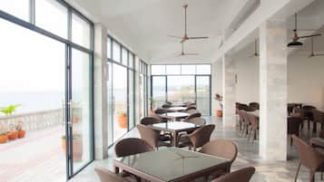 Breakfast, lunch served; local and international cuisine, beach views