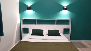 Luxe beddengoed, een bureau, gratis babybedden, gratis wifi