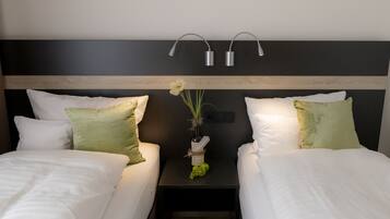 Double or Twin Room, Private Bathroom | 1 bedroom, hypo-allergenic bedding, in-room safe, desk