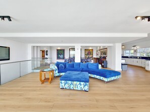 Luxury Villa | Living area | 42-inch plasma TV with satellite channels, TV, ping pong - The Blue Emerald (Cape Town)