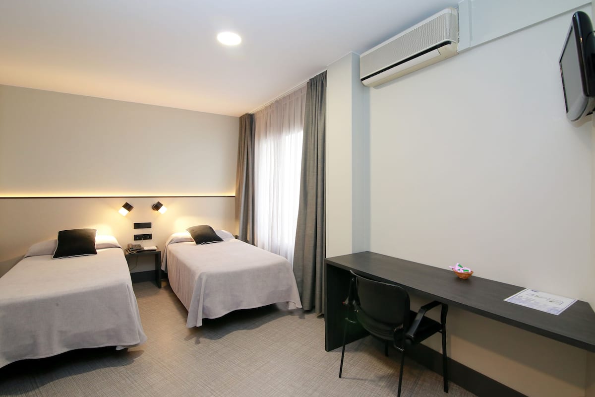 twin room | in-room safe, desk, blackout curtains, free wifi