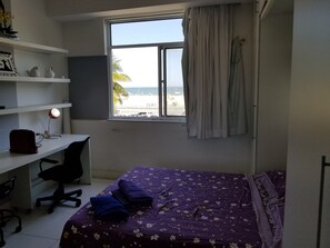 Apartment, 1 Bedroom | 1 bedroom, desk, iron/ironing board, free WiFi - In Rio - Av Atlantica 928 (Rio de Janeiro)