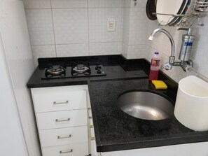 Apartment, 1 Bedroom | Private kitchen | Fridge, microwave, stovetop, espresso maker - In Rio - Av Atlantica 928 (Rio de Janeiro)