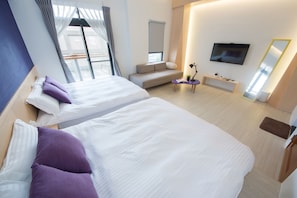 Comfort Quadruple Room, 1 Bedroom, Lanai | 1 bedroom, down comforters, pillowtop beds, minibar - Simple Travel Stay (Wujie)