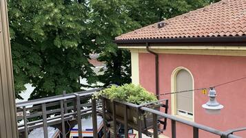 Deluxe Triple Room, River View (Private External Bathroom) | In-room safe, desk, free WiFi, bed sheets