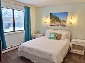 Deluxe Suite, 2 Bedrooms | Individually decorated, iron/ironing board, free cribs/infant beds - Hop & Vine Inn (Fennville)