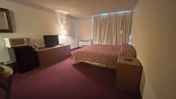 Room, 1 King Bed, Non Smoking (Micfridge) | Desk, free WiFi, bed sheets