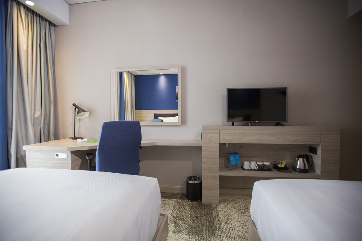 Ropa de cama de alta calidad y minibar 