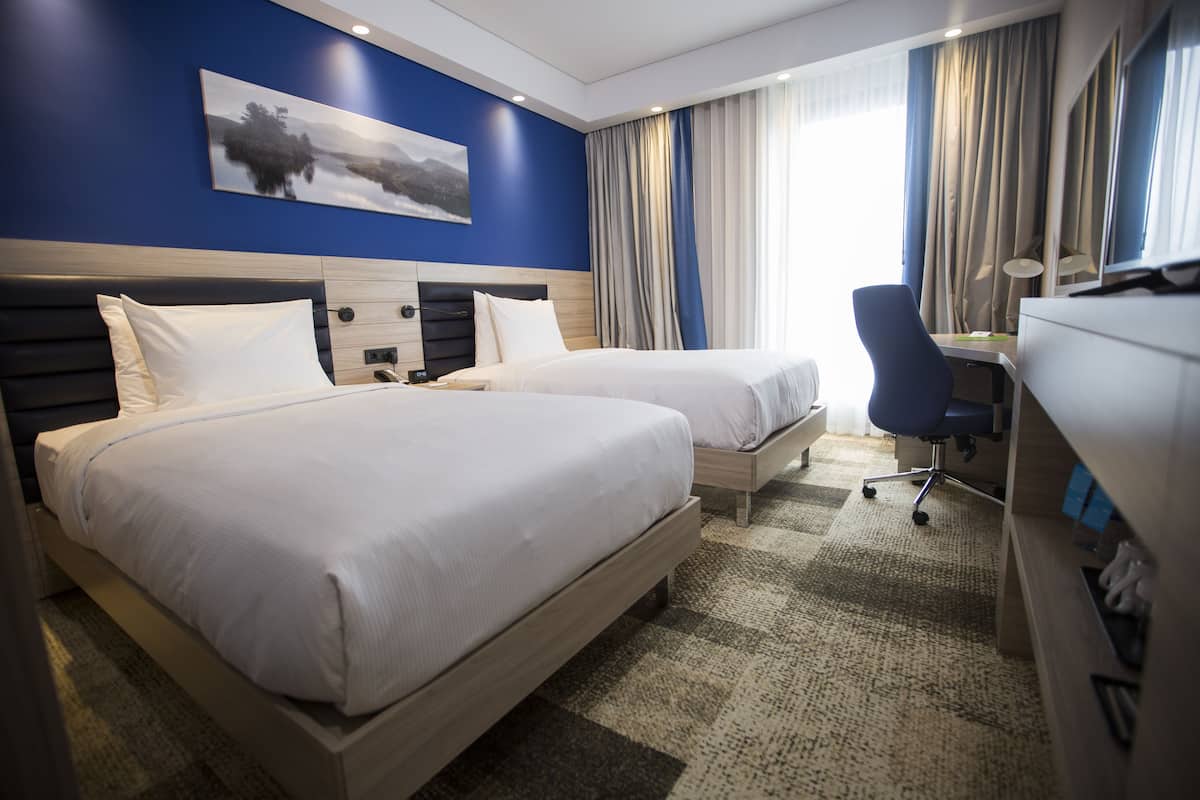 Ropa de cama de alta calidad y minibar