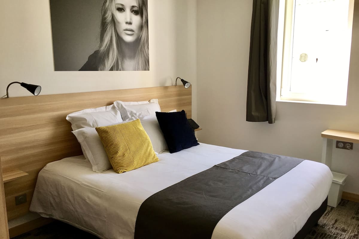 Premium bedding, in-room safe, individually decorated, desk