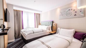 Familien-Dreibettzimmer | 1 Schlafzimmer, Zimmersafe, schallisolierte Zimmer