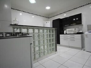 Standard Apartment, 4 Bedrooms | Private kitchen | Fridge, microwave, coffee/tea maker