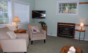 Cottage, Private Bathroom (Oak Hideaway) | Living area | TV, fireplace, DVD player - Oak Street Cottages (Ashland)
