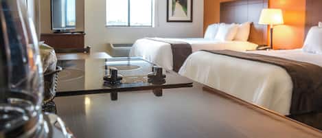 Premium bedding, pillowtop beds, laptop workspace, blackout drapes