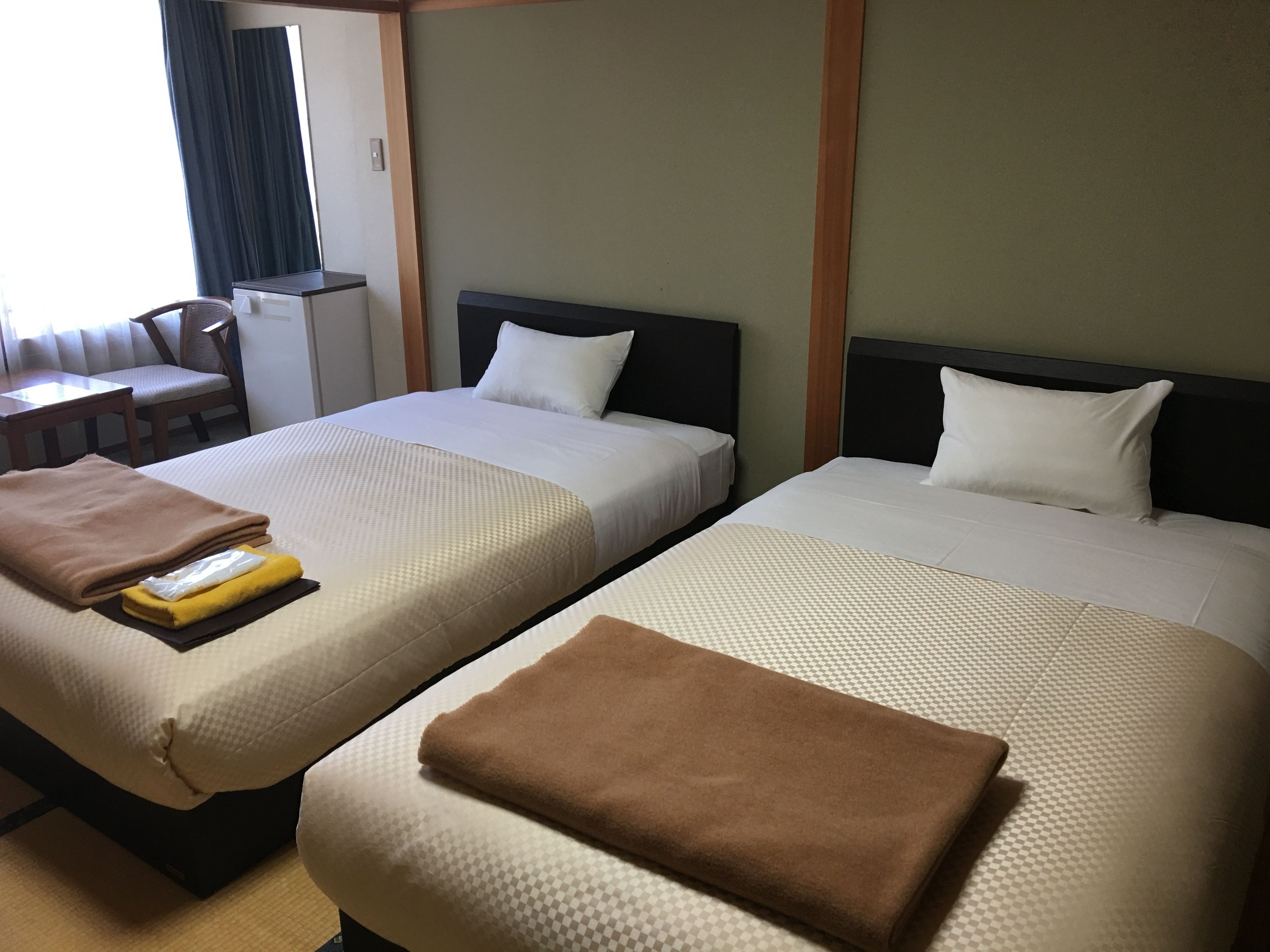 economy twin room (shared bathroom) | in-room safe, free wifi