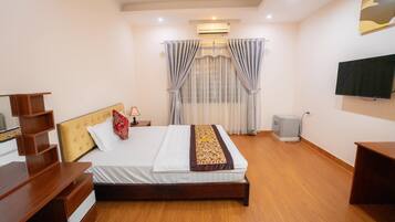 Ropa de cama de alta calidad, minibar y escritorio