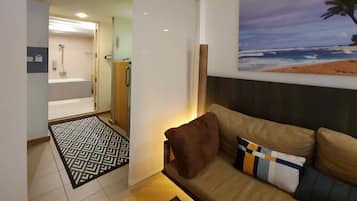 No.1 Suite Escape : King bed + Sofa bed | Living area | 32-inch LCD TV with cable channels, TV