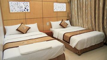 Habitació doble estàndard | Roba de llit d'alta qualitat i matalassos amb encoixinament addicional