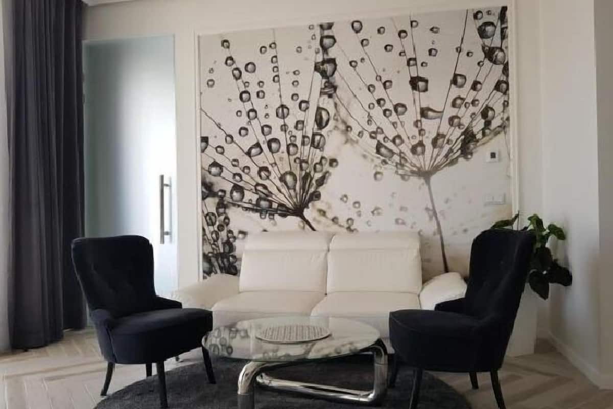 Departamento ejecutivo, 2 camas Queen size | Sala de estar | Televisión de 40 pulgadas con canales por cable