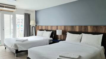 Family Studio: 2 Queen Beds | Desk, laptop workspace, blackout drapes, soundproofing