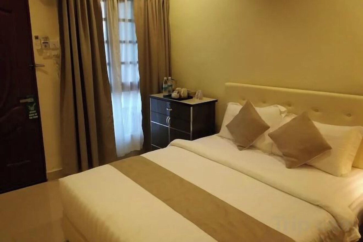 Luxe beddengoed, een minibar, een strijkplank/strijkijzer, beddengoed